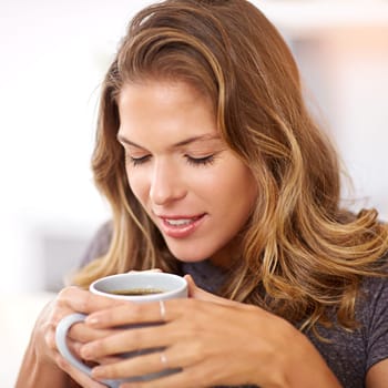 Calm, woman and thinking in home with coffee for morning peace, daily routine and joy of aroma. House, relax and happy female person with warm beverage for stress relief, satisfaction and weekend.