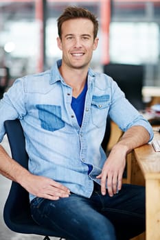 Portrait, smile and business man in office at startup, company or workplace for career in Germany. Happy professional, creative entrepreneur and confident employee, worker or designer at desk job.