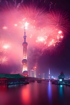 Fireworks show in the night sky over the high towers and river. New Year's fun and festivities. A time of celebration and resolutions.