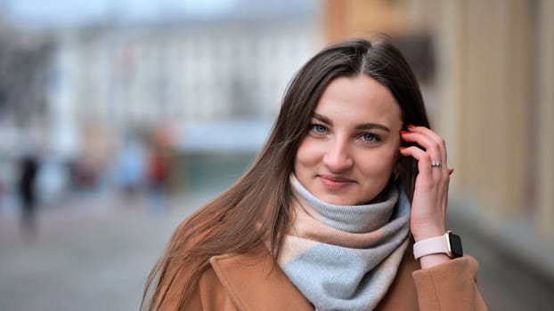 Portrait of a Slavic girl in the city in the cold season