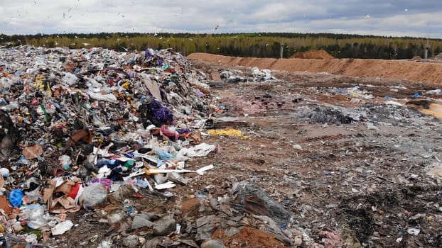 Large landfill near the metropolis. View from the drone