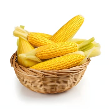 Yellow corn cobs with a leaf in a wicker basket. Corn as a dish of thanksgiving for the harvest. An atmosphere of joy and celebration.