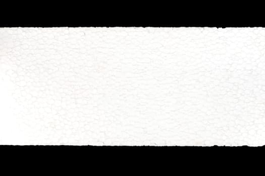 Empty piece of white styrofoam, isolated on black