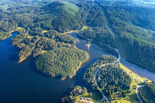 Stunning aerial view at Dam Shiroka Poliana, Bulgaria,  Beautiful blue water and green forest.