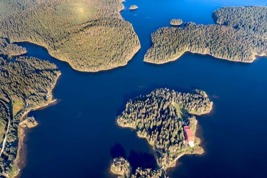 Amazing aerial view at Dam Shiroka Poliana, Bulgaria,  Beautiful blue water and green forest.