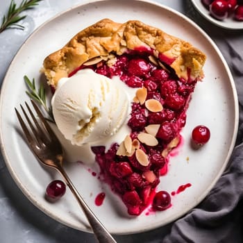 An aerial view of a white plate with vanilla ice cream and cherry pie on it. Pumpkin as a dish of thanksgiving for the harvest. An atmosphere of joy and celebration.