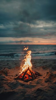 Bonfire on the beach at sunset