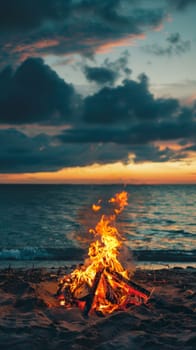 Bonfire on the beach at sunset