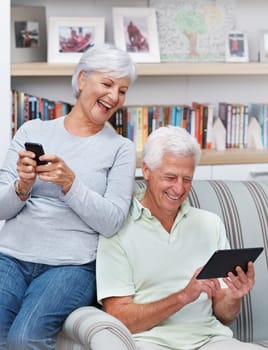 Senior couple, tablet and laugh for joke in home, comedy and streaming comic on social media. Elderly people, funny internet blog and relax on couch, bonding and happy in retirement for online love.