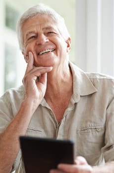 Senior man, tablet and laugh for thought in home, comedy and streaming comic on social media. Elderly male person, funny internet blog and thinking on memory to relax, happy and online in retirement.