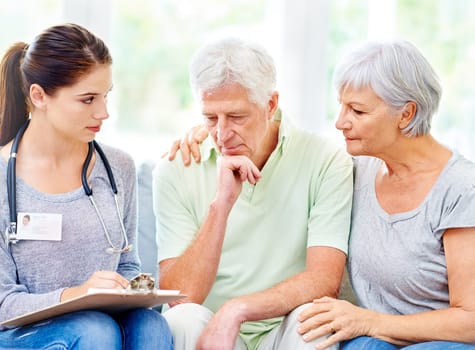 Senior, couple and doctor with results for man in consultation with advice and support. Sad, patient and therapist in elderly care with news, info or medical notes on hypertension or blood pressure.