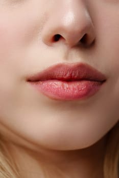 Close-Up of a Womans Lips With Natural Makeup in Soft Daylight