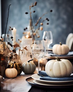 Elegantly set table with candles and white pumpkins. Pumpkin as a dish of thanksgiving for the harvest. An atmosphere of joy and celebration.