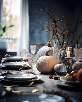 Elegantly set table with candles and white pumpkins. Pumpkin as a dish of thanksgiving for the harvest. An atmosphere of joy and celebration.