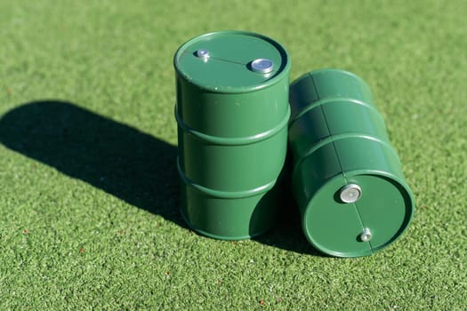 oil barrels on green background. High quality photo