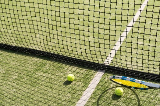 Tennis net on a green field. High quality photo