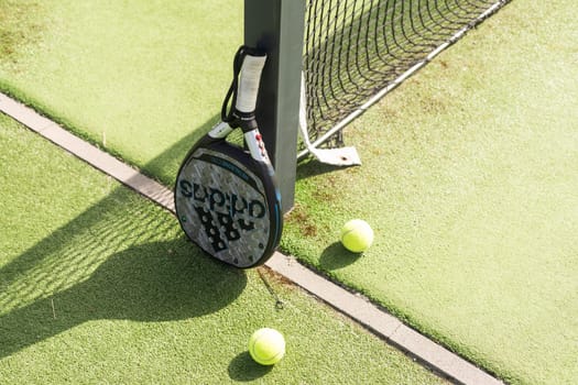 Ukraine Kyiv, April 02 2024. Paddle tennis racket and ball. High quality photo
