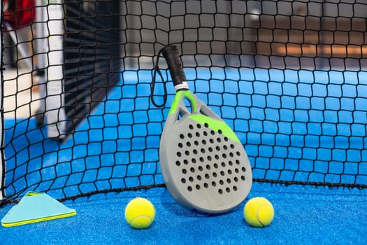 Paddle tennis racket and ball. High quality photo