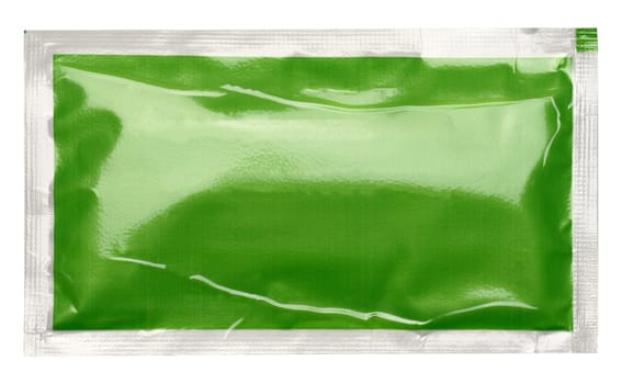 Cellophane rectangular green sachet for wet wipes, sugar and spices on isolated background