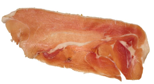 Piece of thinly sliced jamon on isolated background, top view
