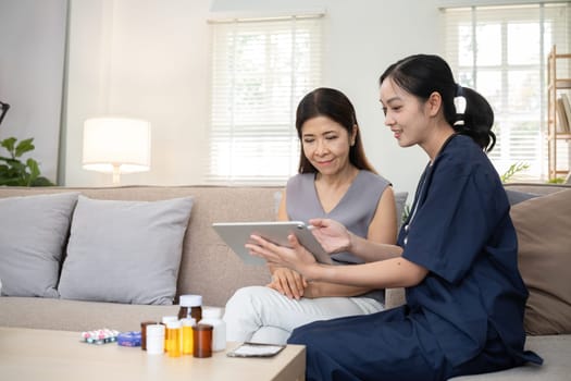 A young woman who takes care of the sick sits and gives advice to a retired woman about health care and the use of tonics.