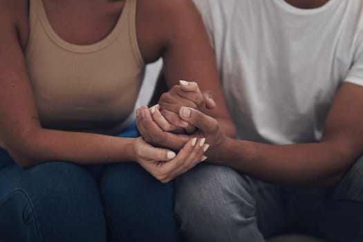 Couple, love and holding hands for trust, care and solidarity or romance with respect. Compassion, partnership and support for bad news in relationship, grief and marriage therapy for hope and unity.