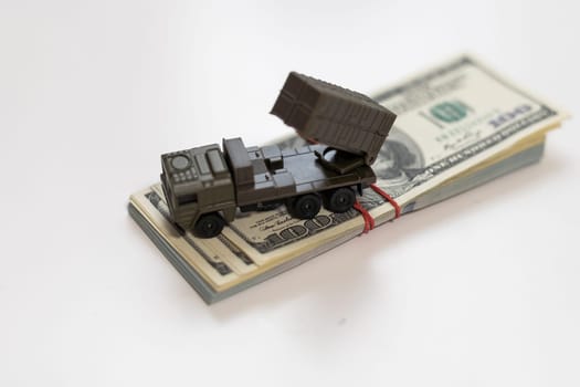 a toy military machine air defense and money. High quality photo