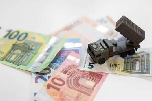 a toy military machine air defense and money. High quality photo