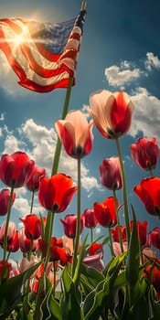 A picturesque field of red and white tulips with an American flag fluttering in the background, set against a sky dotted with fluffy clouds