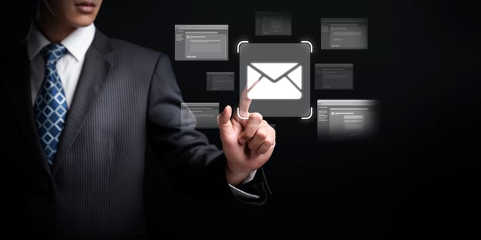 Business person checking email inbox, organizing and prioritizing messages for better productivity. Learn smart email techniques for effective communication. FaaS