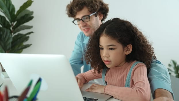 Caucasian father teaching attractive daughter about coding engineering prompt while american school girl focus on looking laptop screen and study programing system. Pedagogy and ai generate. Pedagogy.