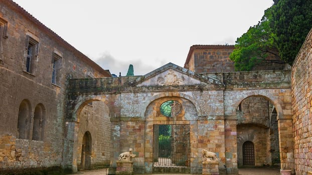 Fontfroide Abbey or Abbaye de Fontfroide is monastery in France gothic walls and arches