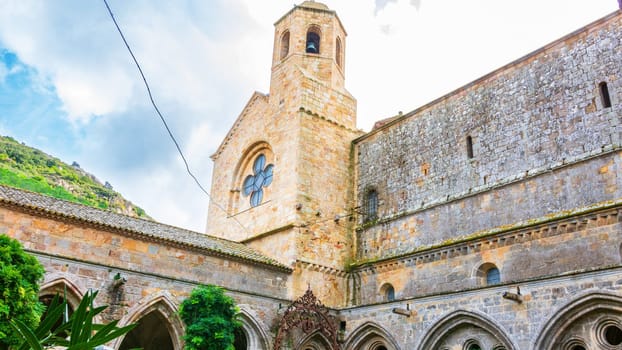 Fontfroide Abbey or Abbaye de Fontfroide is monastery in France gothic walls and arches