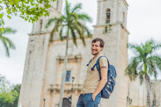 Man tourist explores the vibrant streets of Valladolid, Mexico, immersing herself in the rich culture and colorful architecture of this charming colonial town.