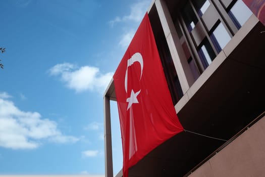 Turkish flag hanging on the window.