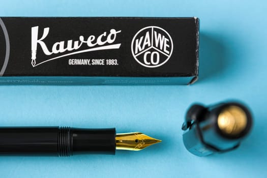 Antalya, Turkey - April 22, 2024: Kaweco Classic Sport fountain pen in black with its box on a blue background