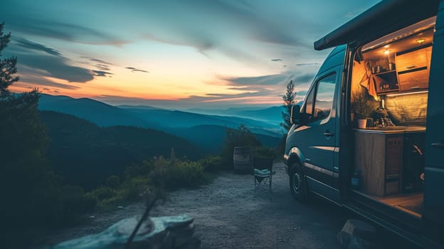 Camper van parked on a mountain at sunset with panoramic views of the valley