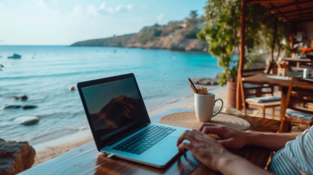 Laptop open on a beachfront table, blending work and leisure with a beautiful coastal backdrop