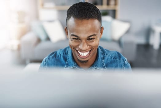 Confidence, smile and black man by computer in office, workspace and desk happy in creative career. Happiness, internship and journalist with technology for typing, research and internet for working.