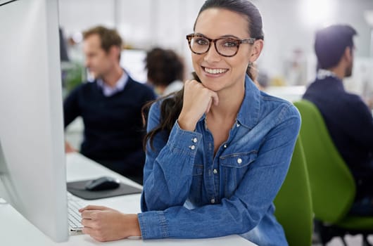 Portrait, woman and employees with computer, smile and office as team for company, startup or business. Businesspeople, happy and technology for web design, cybersecurity and development in IT.