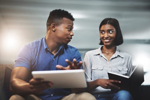 Training, meeting and business people with books in office for learning, planning or writing, notes and reminder with lens flare. Notebook, coaching or manager show intern manual, file or portfolio.