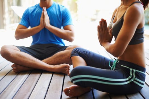 Couple, people and home for meditation with peace, calm and mindfulness or spirituality. Relationship, mental health and zen as activity or hobby for wellness, wellbeing and self care for balance.