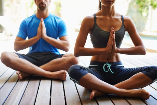 Couple, people and home to meditate for peace, calm and mindfulness or spirituality. Relationship, mental health and zen as activity or hobby for wellness, wellbeing and self care for balance.