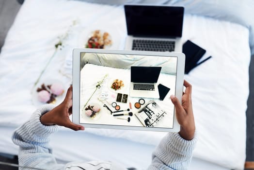 Person, hands and tablet photography or screen home with makeup, content creator or brand ambassador. Top view, bedroom and cosmetic pictures for social media post or unboxing, laptop or influencer.