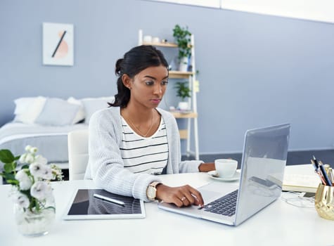 Its time for my daily post. Cropped shot of an attractive young woman working at home