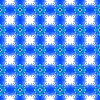 Watercolor ikat repeating tile border. Blue fascinating boho chic summer design. Ikat repeating swimwear design. Textile ready cool print, swimwear fabric, wallpaper, wrapping.