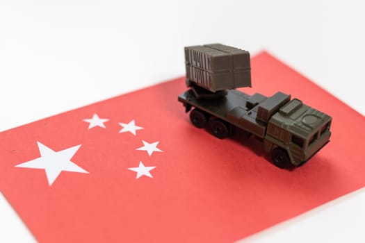 military equipment as tank with flag of China on white background. Countries' military forces topic. High quality photo