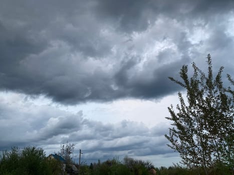 Thunderclouds before rain in a the village