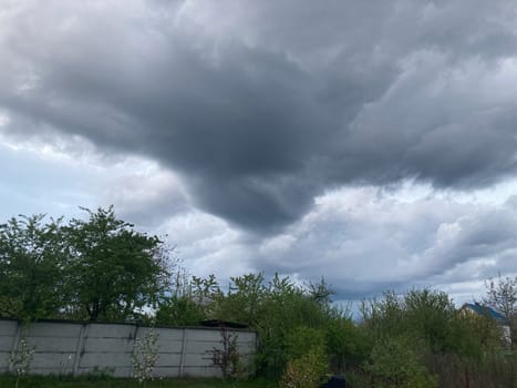 Thunderclouds before rain in a the village