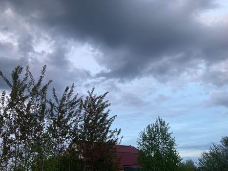 Thunderclouds before rain in a the village